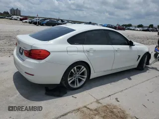 2015 BMW 4 Series 428i с VIN WBA4A5C55FGK16037, выставлен на аукционе Copart как лот 57650695 с пробегом Не указан миль и Списание • Salvage title. История ставок и продаж доступна на DreamBid. Изображение 3.