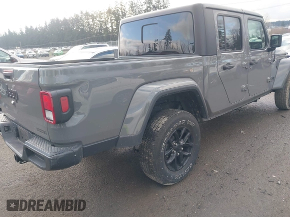 2021 Jeep Gladiator Willys with VIN 1C6HJTAG5ML616706, listed as a IAAI auction lot 41367142 with 50,951 mi miles and . Bid and sale history available at carsss.com. Image 4.