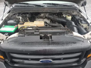 1999 Ford Super Duty F-250 XL with VIN 1FTNF20L0XEA51389, listed as a Copart auction lot 52618635 with 198,767 mi miles and Salvage Title. Bid and sale history available at carsss.com. Image 13.