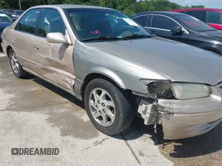 1997 Toyota Camry LE z VIN JT2BF22K6V0081619, wystawiony jako IAAI lot #42344289 z przebiegiem Nie podano mil oraz . Historia ofert i sprzedaży dostępna na DreamBid. Obrazek 6.