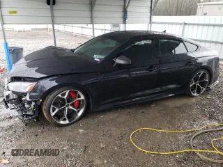 2023 Audi RS 5 Sportback z VIN WUAAWCF58PA903057, wystawiony jako Copart lot #47098845 z przebiegiem Nie podano mil oraz Szkoda całkowita • Salvage title. Historia ofert i sprzedaży dostępna na DreamBid. Obrazek 1.