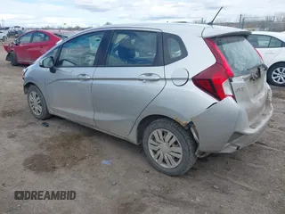 2015 Honda Fit LX with VIN 3HGGK5H57FM784299, listed as a IAAI auction lot 41863989 with 169,657 mi miles. Bid and sale history available at carsss.com. Image 3.