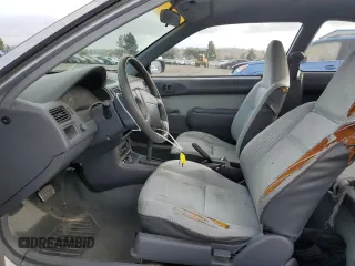 1996 Toyota Tercel DX z VIN JT2AC52L2T0137695, wystawiony jako Copart lot #86535844 z przebiegiem 246 554 mil mil oraz Czysty tytuł • Clean title. Historia ofert i sprzedaży dostępna na DreamBid. Obrazek 7.
