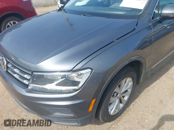 2018 Volkswagen Tiguan SEL z VIN 3VV3B7AX1JM045203, wystawiony jako IAAI lot #42572229 z przebiegiem 104 873 mil mil oraz . Historia ofert i sprzedaży dostępna na DreamBid. Obrazek 18.