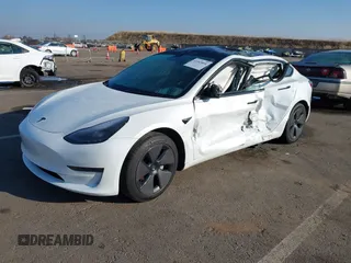2023 Tesla Model 3 with VIN 5YJ3E1EA2PF582331, listed as a IAAI auction lot 41043858 with 33,601 mi miles and . Bid and sale history available at DreamBid. Image 17.