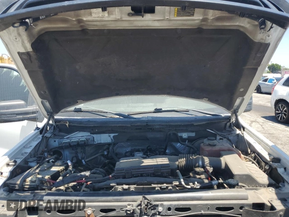 2010 Ford F-150 XL with VIN 1FTMF1CW9AKE60415, listed as a Copart auction lot 63750515 with 196,809 mi miles and Clean title. Bid and sale history available at DreamBid. Image 11.