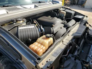 2003 Hummer H2 z VIN 5GRGN23U33H102150, wystawiony jako Copart lot #56997295 z przebiegiem Nie podano mil oraz Tytuł czysty. Historia ofert i sprzedaży dostępna na DreamBid. Obrazek 12.
