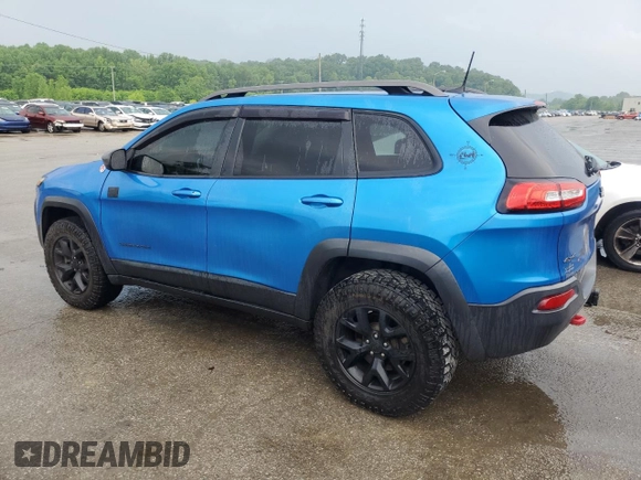 2017 Jeep Cherokee Trailhawk z VIN 1C4PJMBS1HW648716, wystawiony jako Copart lot #57490635 z przebiegiem 94 983 mil mil oraz Szkoda całkowita • Salvage title. Historia ofert i sprzedaży dostępna na DreamBid. Obrazek 2.
