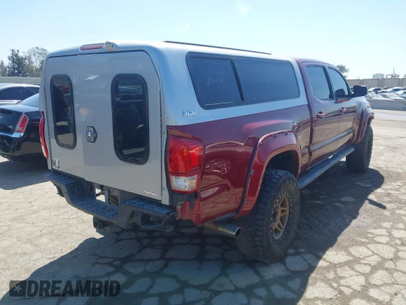 2017 Toyota Tacoma SR5 with VIN 3TMDZ5BN7HM017500, listed as a IAAI auction lot 41819027 with 112,406 mi miles. Bid and sale history available at carsss.com. Image 4.
