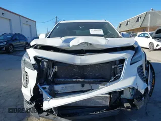 2022 Cadillac XT4 AWD Luxury with VIN 1GYFZBR42NF170554, listed as a IAAI auction lot 41409705 with 38,727 mi miles and . Bid and sale history available at carsss.com. Image 13.