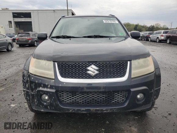 2009 Suzuki Grand Vitara z VIN JS3TE149794100133, wystawiony jako Copart lot #52919795 z przebiegiem 207 928 mil mil oraz Szkoda całkowita • Salvage title. Historia ofert i sprzedaży dostępna na DreamBid. Obrazek 5.