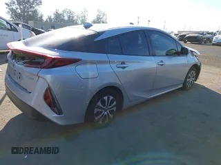 2022 Toyota Prius LE with VIN JTDKAMFP3N3209448, listed as a IAAI auction lot 40533784 with 116,436 mi miles and . Bid and sale history available at DreamBid. Image 4.