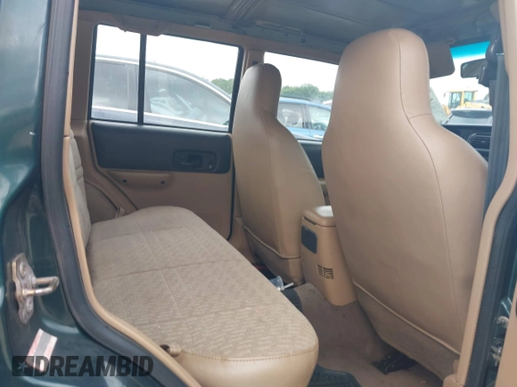 2000 Jeep Cherokee z VIN 1J4FT48S4YL265734, wystawiony jako IAAI lot #42556994 z przebiegiem 228 162 mil mil oraz . Historia ofert i sprzedaży dostępna na DreamBid. Obrazek 8.