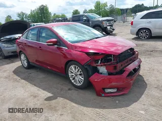2016 Ford Focus Titanium with VIN 1FADP3J22GL314021, listed as a IAAI auction lot 42212462 with 142,370 mi miles and . Bid and sale history available at DreamBid. Image 1.