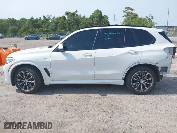 2021 BMW X5 xDrive45e with VIN 5UXTA6C08M9F38909, listed as a IAAI auction lot 42172536 with 71,741 mi miles and . Bid and sale history available at DreamBid. Image 15.