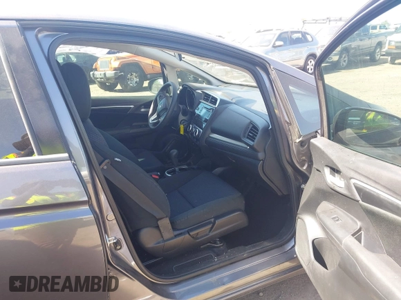 2018 Honda Fit LX with VIN 3HGGK5H51JM731851, listed as a IAAI auction lot 42570144 with 69,236 mi miles and . Bid and sale history available at DreamBid. Image 5.