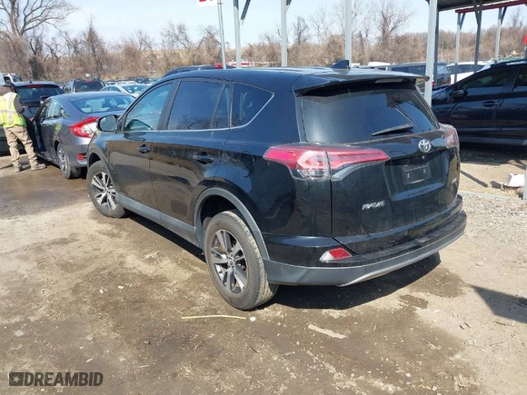 2018 Toyota RAV4 XLE with VIN 2T3WFREV6JW477658, listed as a IAAI auction lot 41706807 with 146,829 mi miles. Bid and sale history available at carsss.com. Image 3.
