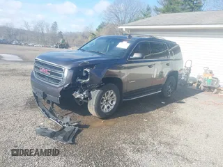 2016 GMC Yukon SLE with VIN 1GKS2AKC9GR273724, listed as a IAAI auction lot 41945761 with 141,425 mi miles. Bid and sale history available at carsss.com. Image 2.