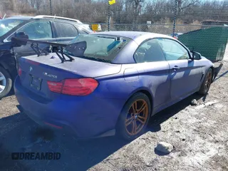 2014 BMW 4 Series 428i xDrive with VIN WBA3T1C58EPS98939, listed as a IAAI auction lot 41649313 with 35,994 mi miles and . Bid and sale history available at carsss.com. Image 4.