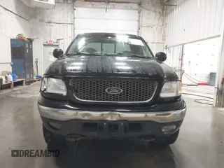1999 Ford F-150 with VIN 1FTRX18W0XNB70955, listed as a IAAI auction lot 42692083 with Not provided miles and . Bid and sale history available at DreamBid. Image 12.