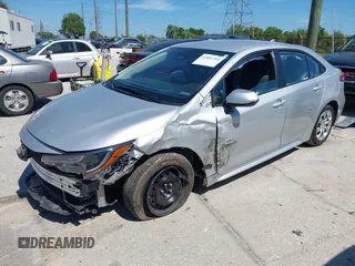 2023 Toyota Corolla LE with VIN 5YFB4MDE7PP012267, listed as a IAAI auction lot 41891314 with 51,419 mi miles and . Bid and sale history available at DreamBid. Image 2.