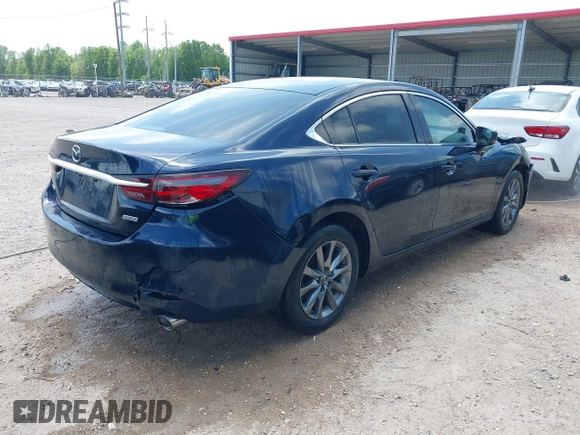 2018 Mazda 6 Sport with VIN JM1GL1UM7J1334658, listed as a IAAI auction lot 41938763 with 129,563 mi miles. Bid and sale history available at carsss.com. Image 4.