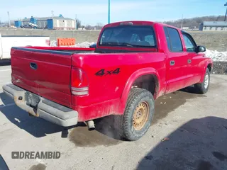 2004 Dodge Dakota Sport with VIN 1D7HG38KX4S735459, listed as a IAAI auction lot 41402108 with 262,730 mi miles. Bid and sale history available at carsss.com. Image 4.
