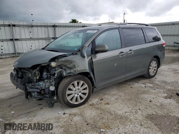 2011 Toyota Sienna XLE AAS with VIN 5TDYK3DC9BS120799, listed as a Copart auction lot 61470045 with 194,422 mi miles and Salvage title. Bid and sale history available at DreamBid. Image 1.