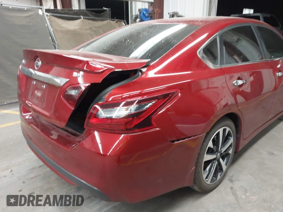 2018 Nissan Altima SR with VIN 1N4AL3AP4JC120138, listed as a IAAI auction lot 42111389 with 69,939 mi miles and . Bid and sale history available at carsss.com. Image 6.