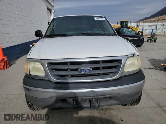 2003 Ford F-150 XL with VIN 2FTRF18W53CA04398, listed as a Copart auction lot 42981485 with 244,706 mi miles and Salvage title. Bid and sale history available at DreamBid. Image 5.