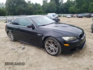 2011 BMW M3 with VIN WBSDX9C54BE584619, listed as a Copart auction lot 57599294 with 130,976 mi miles and Salvage Title. Bid and sale history available at carsss.com. Image 4.