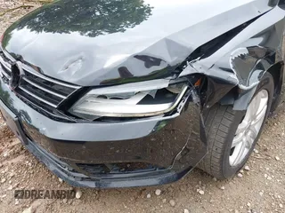 2017 Volkswagen Jetta S z VIN 3VW2B7AJ3HM303198, wystawiony jako IAAI lot #42651056 z przebiegiem 126 253 mil mil oraz . Historia ofert i sprzedaży dostępna na DreamBid. Obrazek 18.