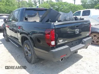2021 Honda Ridgeline Sport with VIN 5FPYK3F15MB026171, listed as a IAAI auction lot 42265057 with 92,981 mi miles and . Bid and sale history available at DreamBid. Image 3.