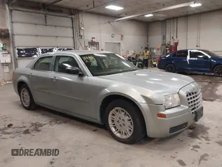 2005 Chrysler 300 with VIN 2C3JA43R55H569369, listed as a IAAI auction lot 41132751 with 123,253 mi miles. Bid and sale history available at carsss.com. Image 14.