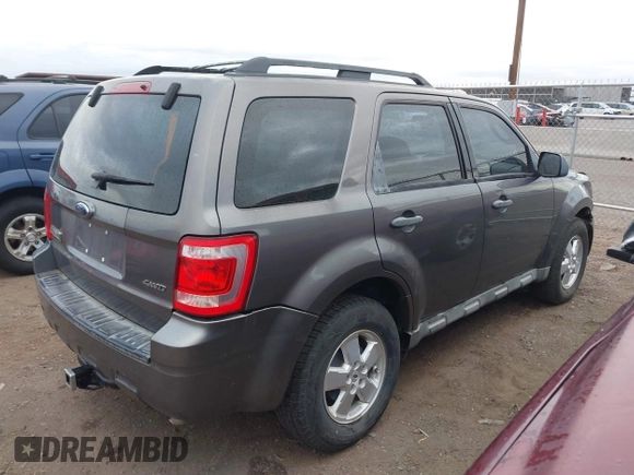 2009 Ford Escape XLS with VIN 1FMCU92769KD15656, listed as a IAAI auction lot 42185560 with 110,792 mi miles and . Bid and sale history available at DreamBid. Image 4.