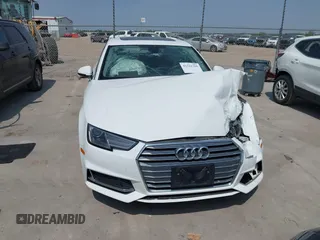 2019 Audi A4 Premium z VIN WAUGMAF48KN007428, wystawiony jako IAAI lot #42311766 z przebiegiem 65 249 mil mil oraz . Historia ofert i sprzedaży dostępna na DreamBid. Obrazek 12.