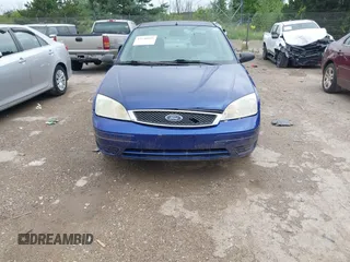 2005 Ford Focus S with VIN 1FAFP34N35W229229, listed as a IAAI auction lot 42738975 with 107,388 mi miles and . Bid and sale history available at DreamBid. Image 6.