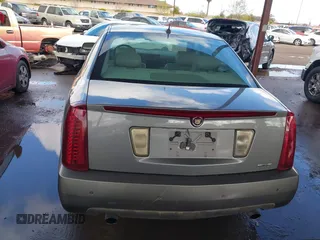 2005 Cadillac STS z VIN 1G6DW677X50185643, wystawiony jako IAAI lot #41730111 z przebiegiem 218 764 mil mil oraz . Historia ofert i sprzedaży dostępna na DreamBid. Obrazek 16.
