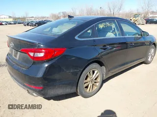 2015 Hyundai Sonata 2.4L SE with VIN 5NPE24AF9FH001329, listed as a IAAI auction lot 41854603 with 104,124 mi miles. Bid and sale history available at carsss.com. Image 4.