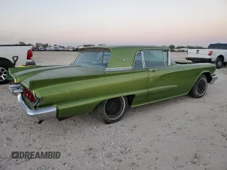 1960 Ford Thunderbird with VIN 0Y71Y166846, listed as a Copart auction lot 80034714 with 74,470 mi miles and Salvage Title. Bid and sale history available at DreamBid. Image 3.