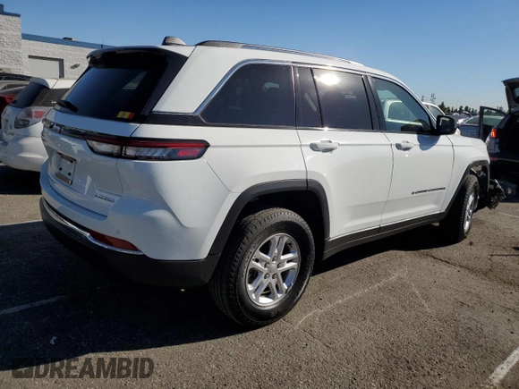 2023 Jeep Grand Cherokee Laredo with VIN 1C4RJGAG5PC610249, listed as a Copart auction lot 81630784 with 43,286 mi miles and Salvage title. Bid and sale history available at DreamBid. Image 3.