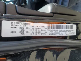 2014 Jeep Grand Cherokee Laredo with VIN 1C4RJFAG9EC534347, listed as a Copart auction lot 54872865 with 122,960 mi miles and Clean Title. Bid and sale history available at carsss.com. Image 13.