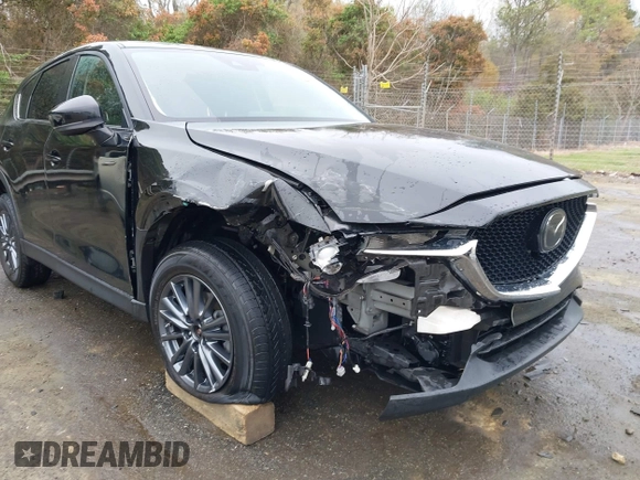 2020 Mazda CX-5 Touring with VIN JM3KFACM9L0770933, listed as a IAAI auction lot 41921464 with 75,997 mi miles. Bid and sale history available at carsss.com. Image 6.