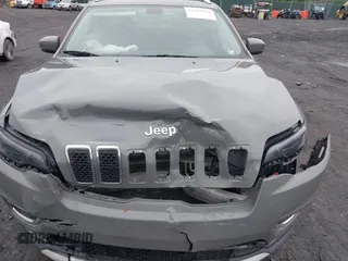 2020 Jeep Cherokee Limited with VIN 1C4PJMDX7LD505976, listed as a IAAI auction lot 42515544 with 68,531 mi miles and . Bid and sale history available at DreamBid. Image 6.