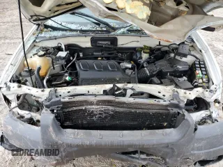 2004 Ford Escape XLS with VIN 1FMYU02144DA18217, listed as a Copart auction lot 43136895 with 135,424 mi miles and Salvage Title. Bid and sale history available at DreamBid. Image 12.