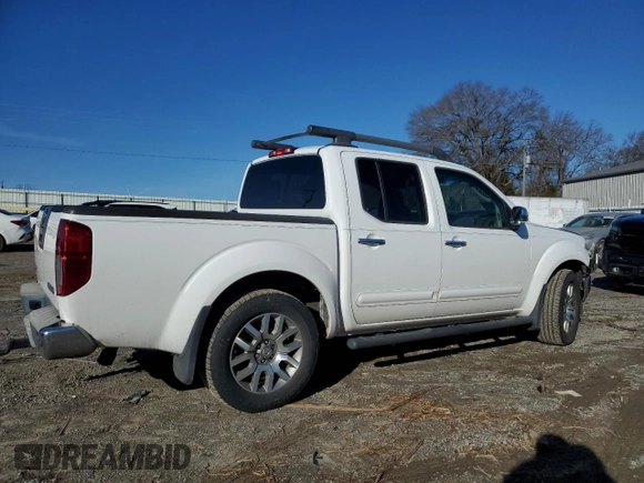 2010 Nissan Frontier LE with VIN 1N6AD0EV5AC407077, listed as a Copart auction lot 44103215 with 224,351 mi miles and Salvage title. Bid and sale history available at DreamBid. Image 3.