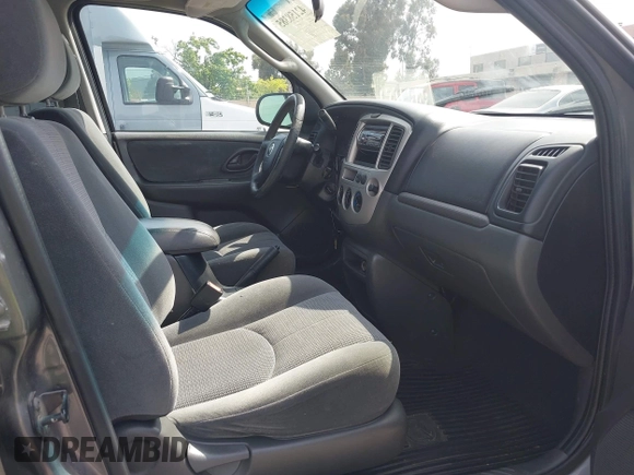 2003 Mazda Tribute LX with VIN 4F2YZ04193KM08890, listed as a IAAI auction lot 42158385 with 282,314 mi miles and . Bid and sale history available at carsss.com. Image 5.