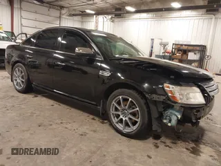 2008 Ford Taurus Limited z VIN 1FAHP25W88G128972, wystawiony jako IAAI lot #42019401 z przebiegiem Nie podano mil oraz . Historia ofert i sprzedaży dostępna na DreamBid. Obrazek 1.