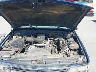 1999 Chevrolet Tahoe with VIN 1GNEC13R7XJ573387, listed as a IAAI auction lot 42001191 with 241,007 mi miles. Bid and sale history available at carsss.com. Image 10.