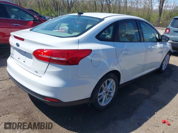 2018 Ford Focus SE with VIN 1FADP3F2XJL310931, listed as a IAAI auction lot 41983492 with 115,363 mi miles. Bid and sale history available at carsss.com. Image 4.